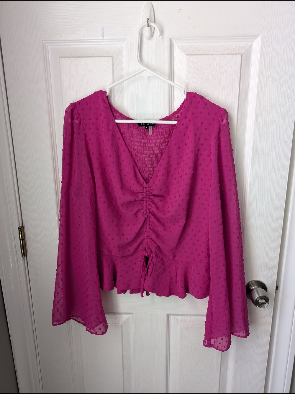 1. State Fuchsia Textured V-Neck Drawstring Blouse
